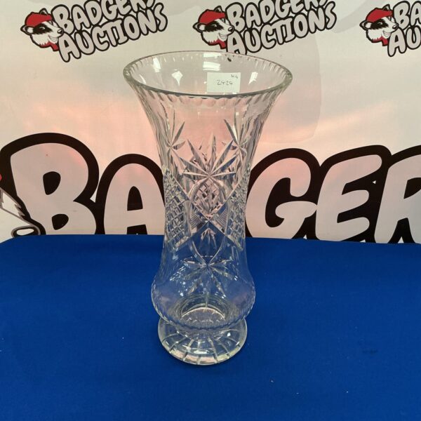 Elegant 15 inch tall crystal vase with intricate cut design.