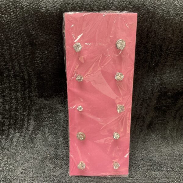 Lot of ten silver cubic zirconia stud earrings.