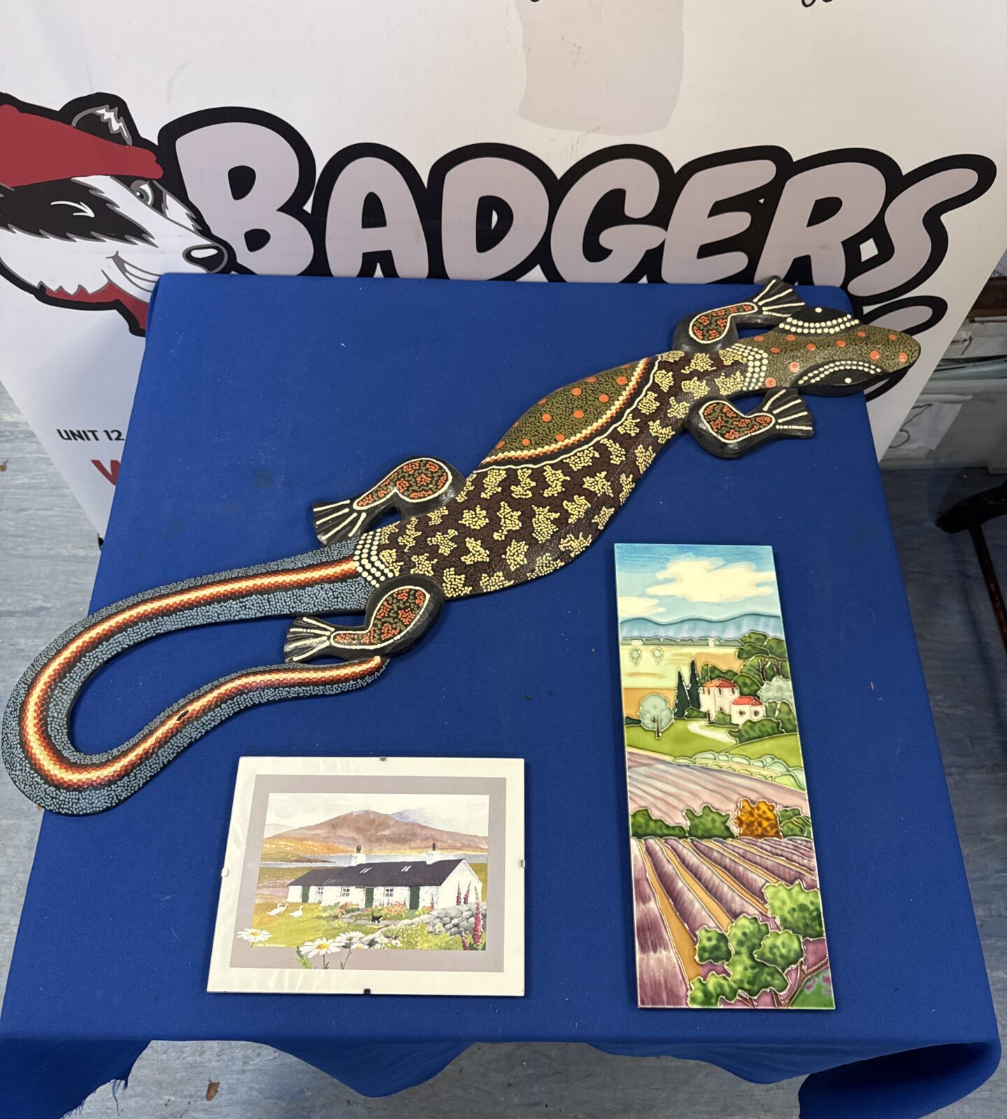 Colourful decorative gecko wall hanging with tile and Ann Southward print.