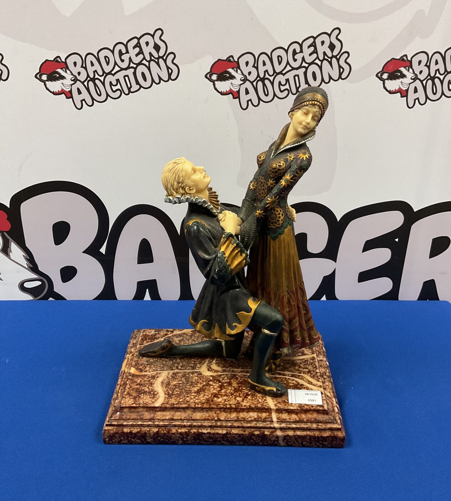 Elegant Art Deco sculpture inspired by Demetre Chiparus on marble base.