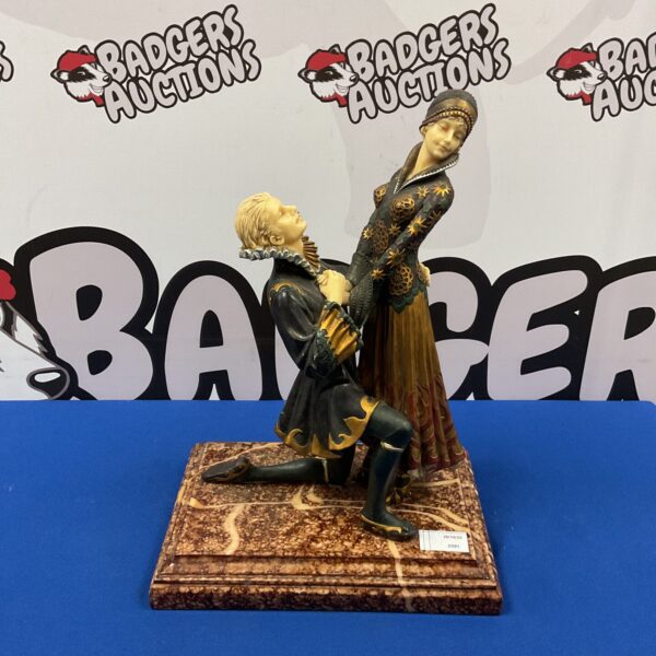 Elegant Art Deco sculpture inspired by Demetre Chiparus on marble base.