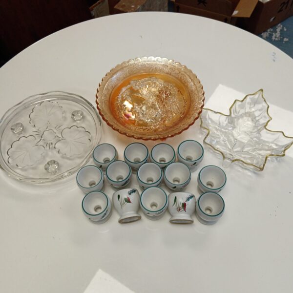 Vintage Denby egg cups and iridescent carnival glass dish collection.