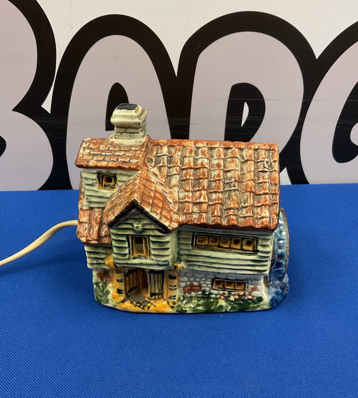 Vintage Derek Fowler pottery table lamp with watermill design.