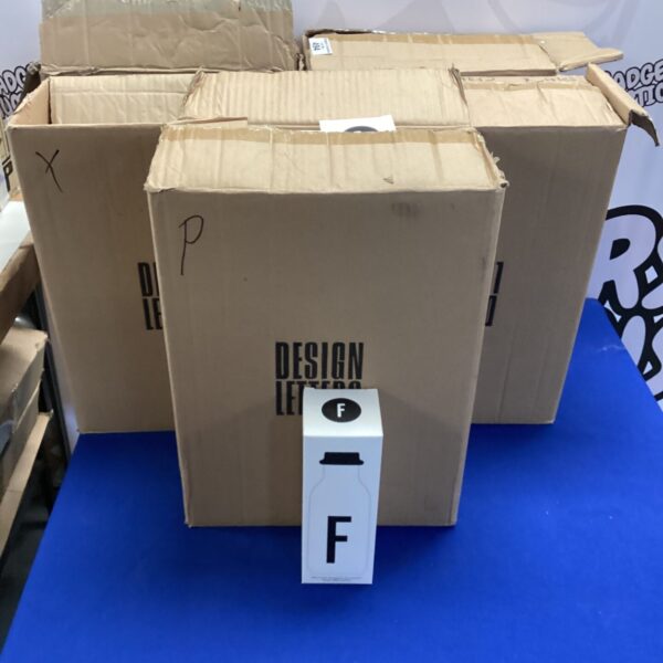 Lot of five boxed Design Letters drinks flasks.