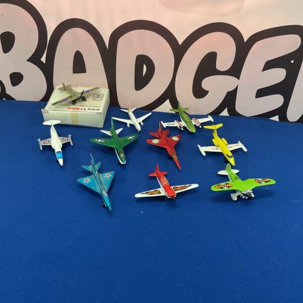 Vintage diecast planes lot including Matchbox and Hurricane models.