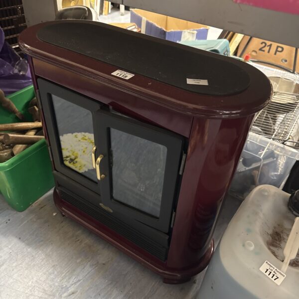 Vintage Dimplex electric stove heater in good condition.