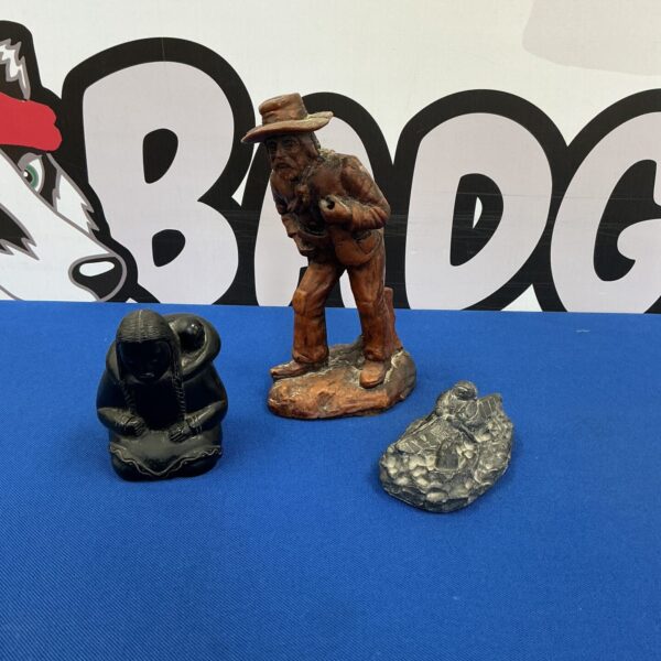 Vintage drunken cowboy figurine with Native American figure.