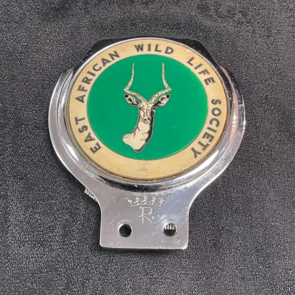 Vintage East African Wildlife Society Kudu grill badge for collectors.