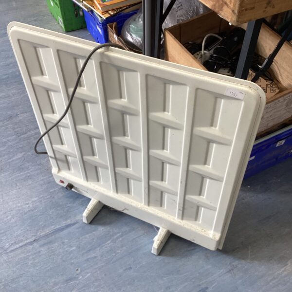 Vintage Electrolux electric radiator with perforated metal front.