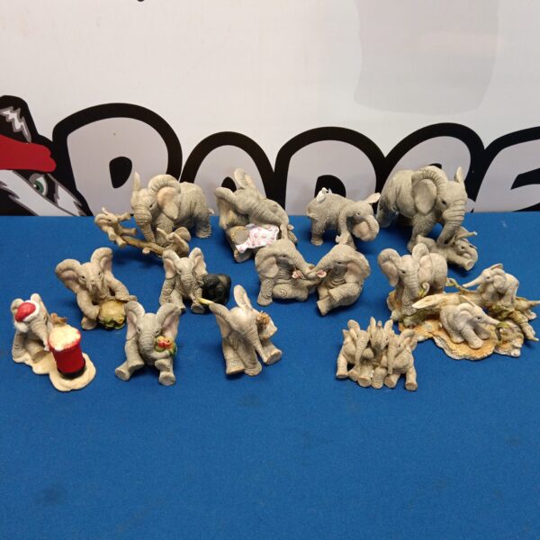Collection of miniature porcelain elephant ornaments, charming tuskers.