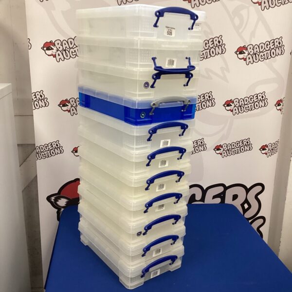 Eleven translucent 4L plastic storage boxes stacked together.