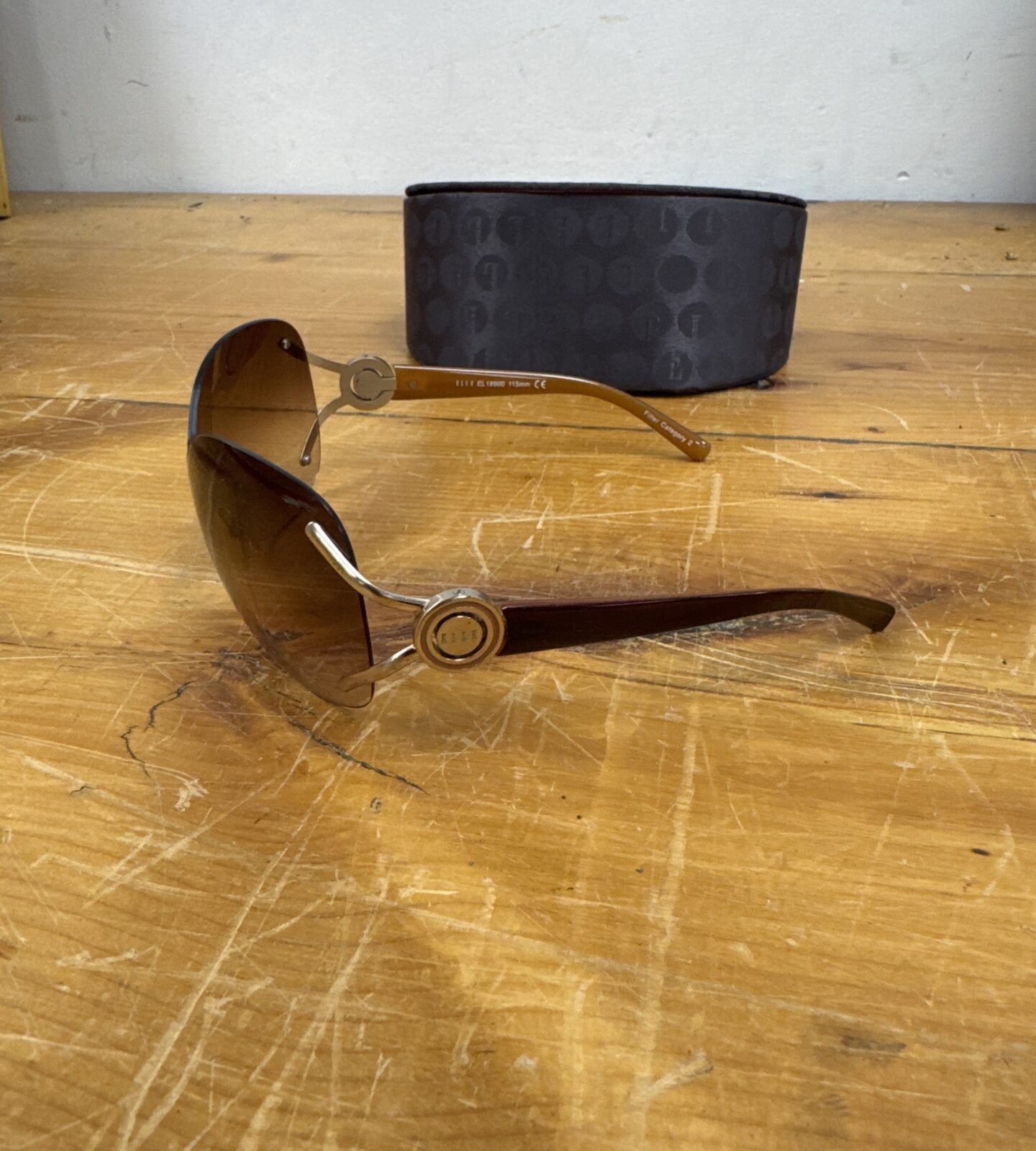 Elle sunglasses with original magnetic closure case.
