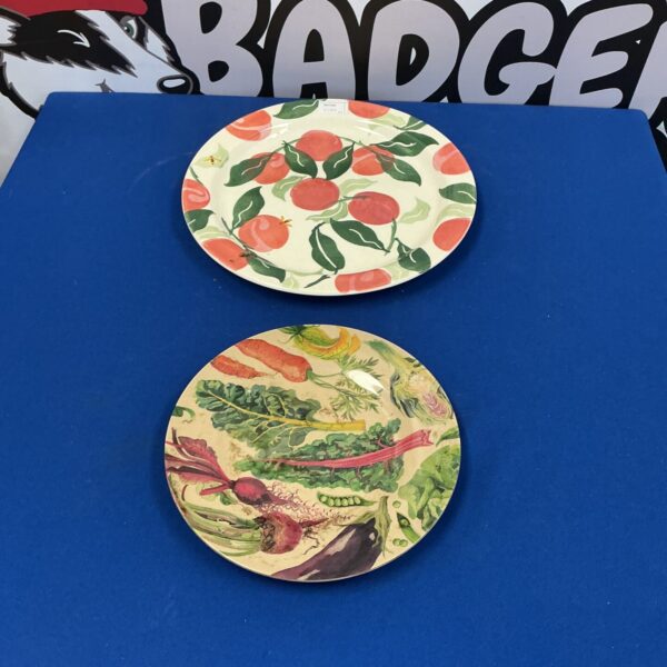 Two Emma Bridgewater plates with a vibrant floral pattern.