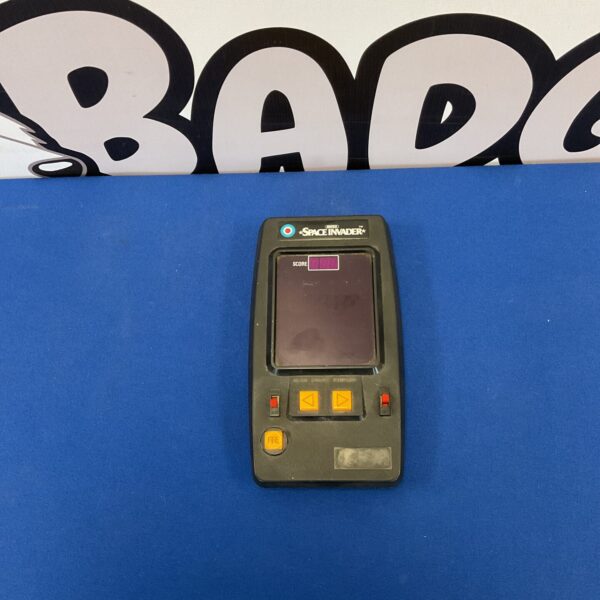 Vintage Entex Space Invader handheld electronic game, 1980s retro gaming.
