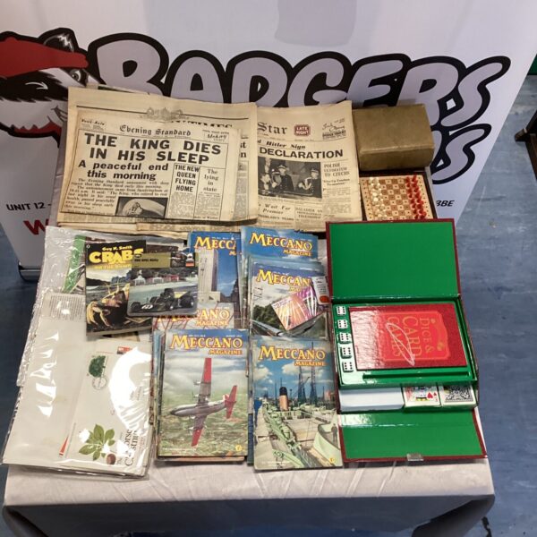 Vintage ephemera lot including Meccano magazines and newspapers.