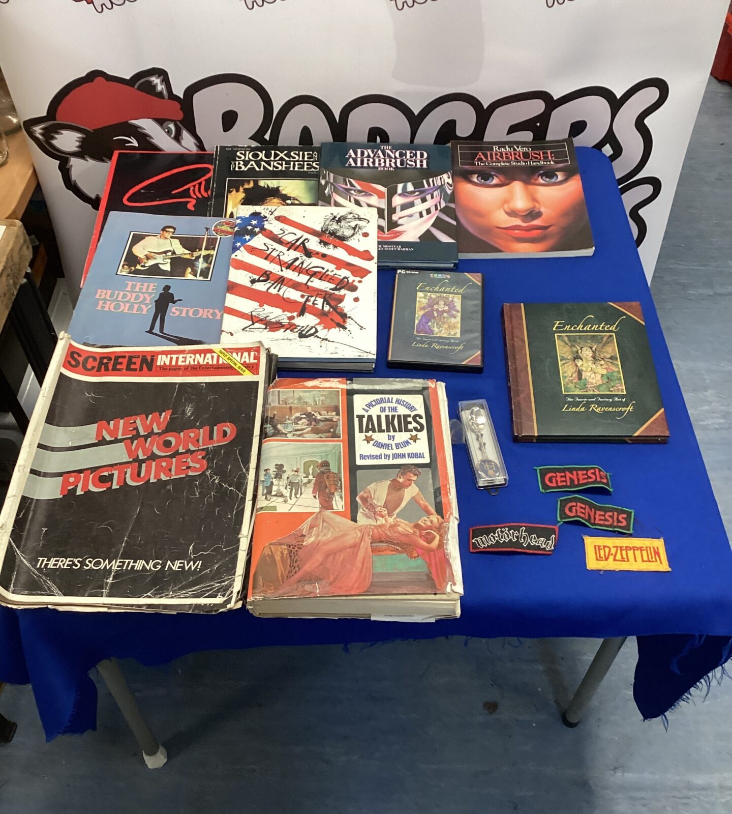 Vintage film and gaming ephemera lot including books and PC game.