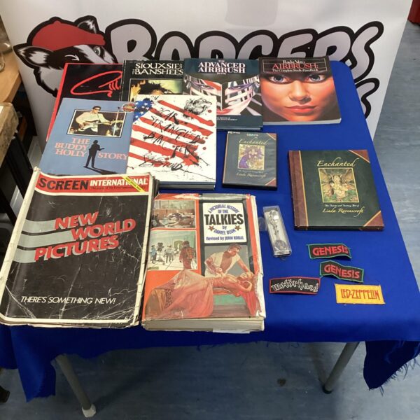 Vintage film and gaming ephemera lot including books and PC game.