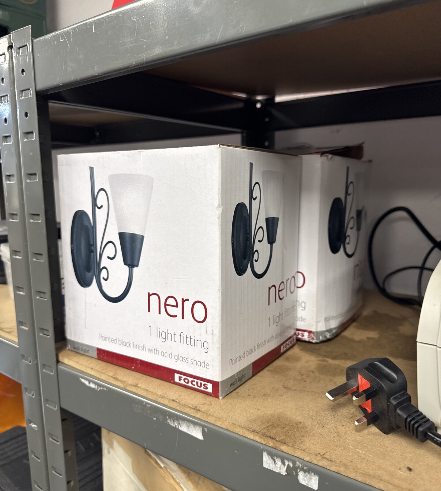 Pair of Focus Nero wall lights in original packaging.