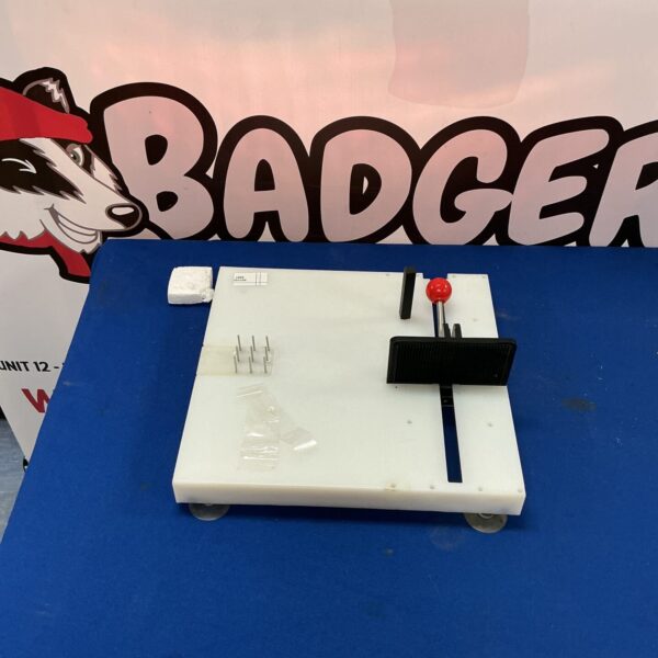 Plastic food preparation board for kitchen use.