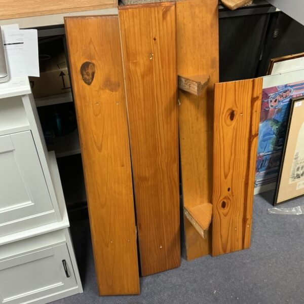 Four unfinished pine shelves for DIY projects and rustic home decor.