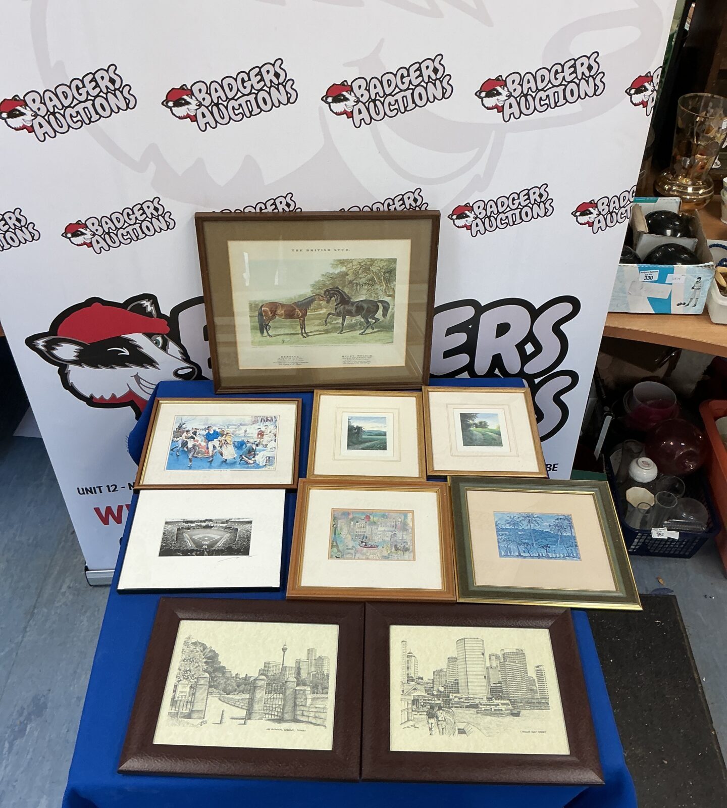 Selection of vintage framed prints for wall decor.