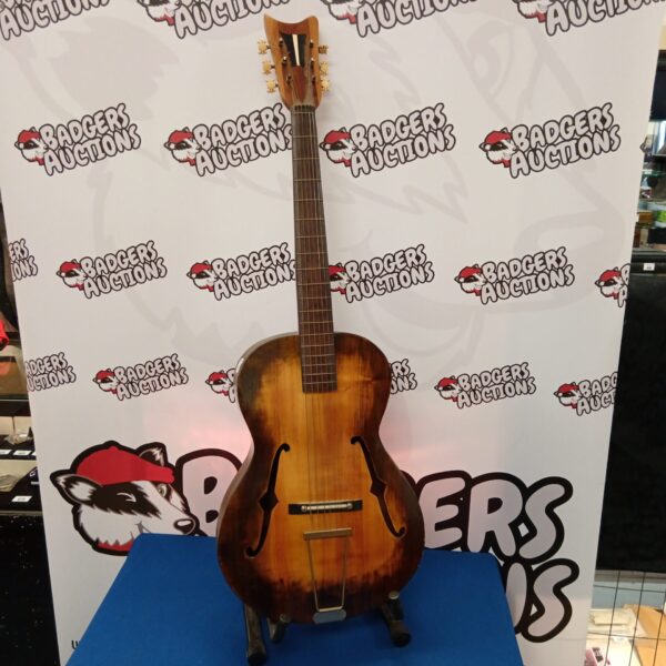 Vintage 1961 Framus 5/50 archtop guitar in sunburst finish.