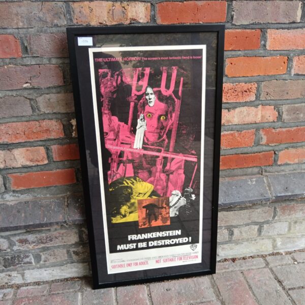 Vintage Frankenstein Must Be Destroyed movie poster featuring Peter Cushing.