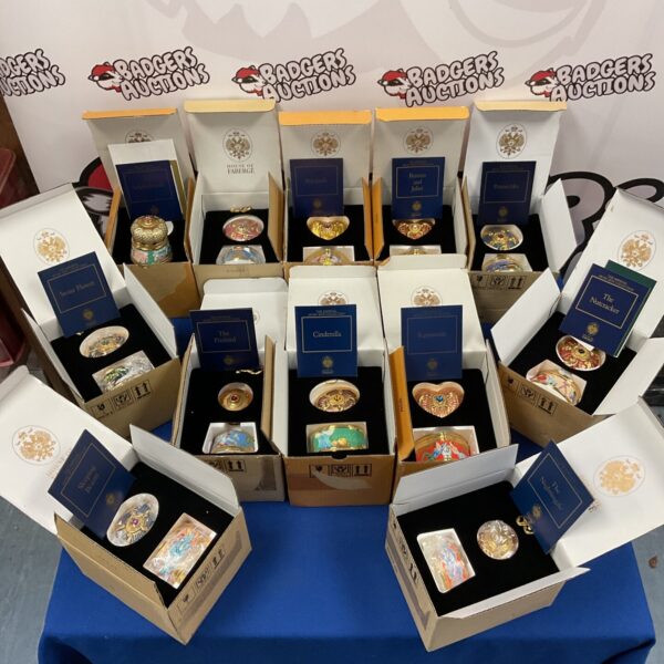 Lot of twelve Franklin Mint House of Faberge music boxes in original packaging.