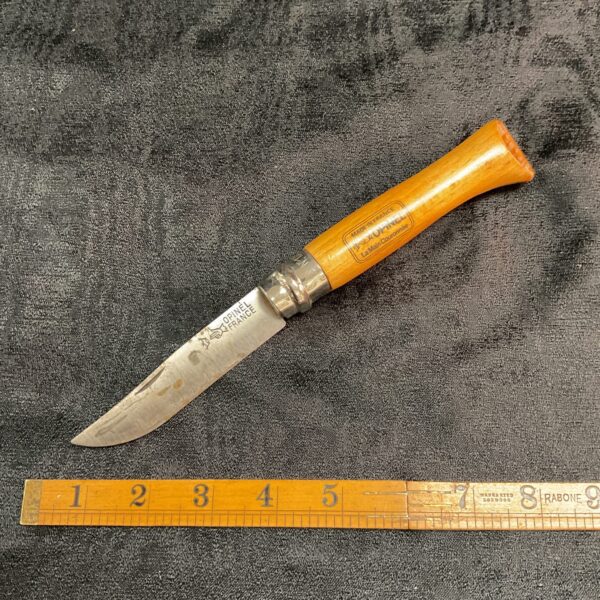 Vintage French Opinel pocket knife with wood handle.