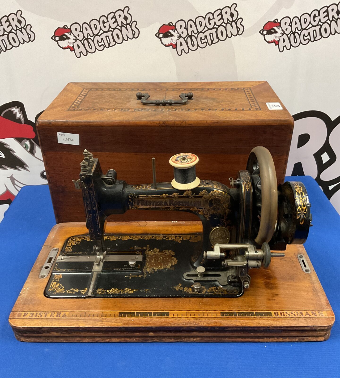 Antique Frister & Rossman hand crank sewing machine in good condition.