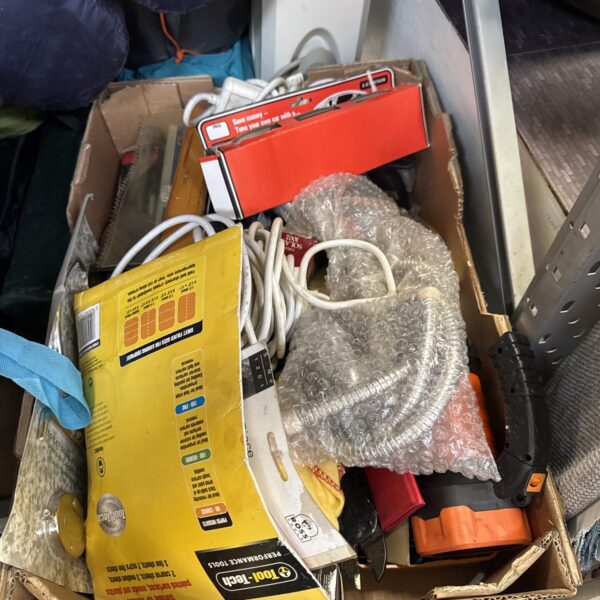 Mixed garage clearance lot with tools and hardware.