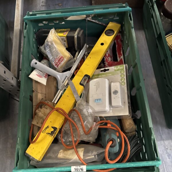 Assorted tools and hardware in a garage clearance lot.