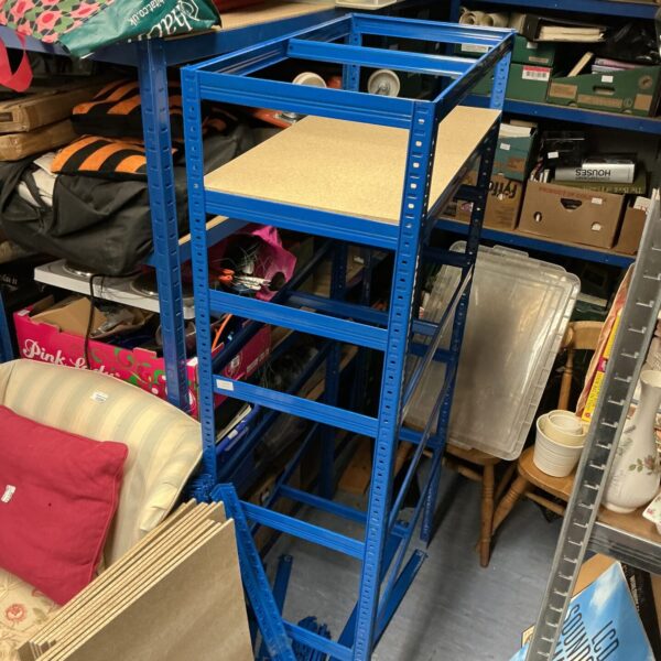 Metal garage racking unit for workshop storage.