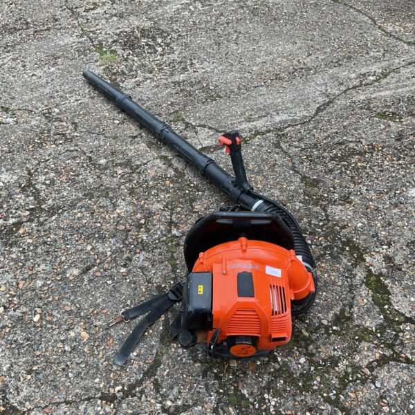 Garden Pride petrol leaf blower for clearing garden debris.