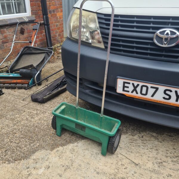 Gardenline garden seeder in a garden setting.