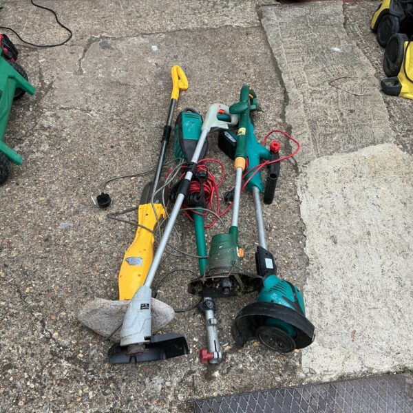 Job lot of electric garden trimmers for spares or repair.