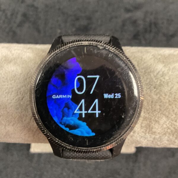 Black Garmin digital smart watch with a clear display.
