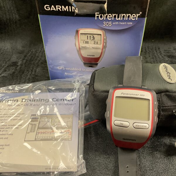 Garmin Forerunner 305 GPS watch with display showing data.