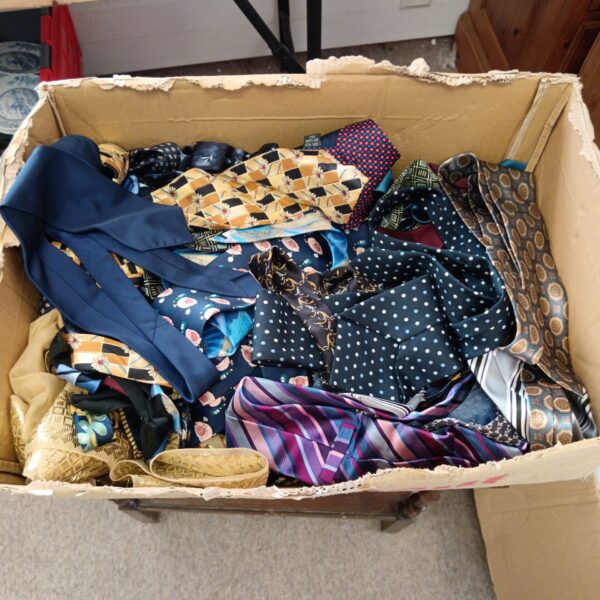 Assorted vintage and silk ties in a mixed lot collection.