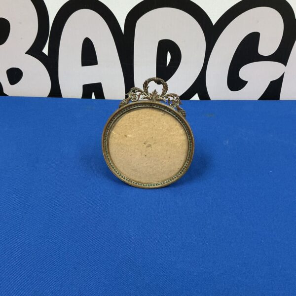 Antique Georgian copper photograph frame, oval shaped, vintage style.