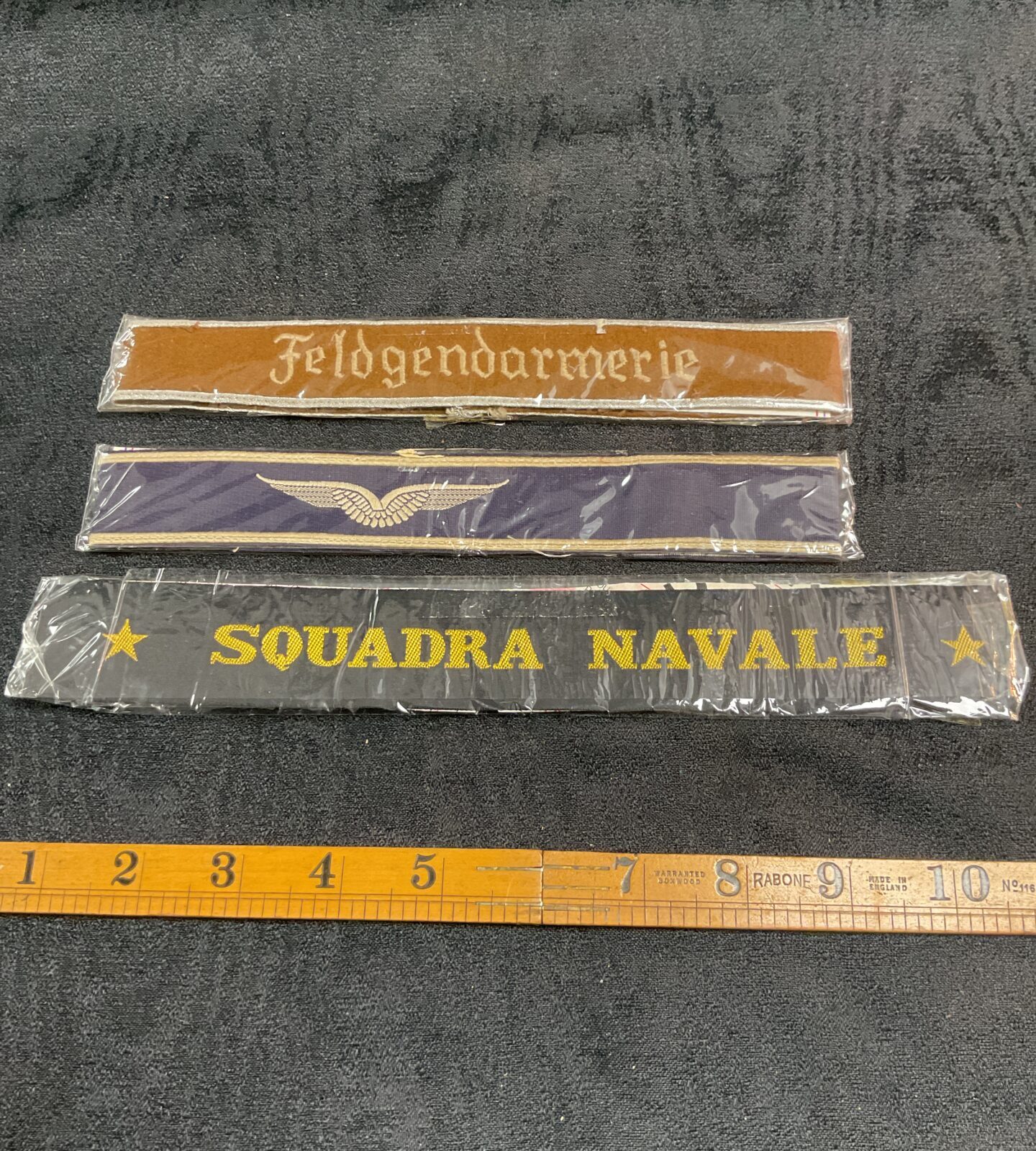 Lot of three original German WWII armbands for Luftwaffe, Police, and Feldgendarmerie.