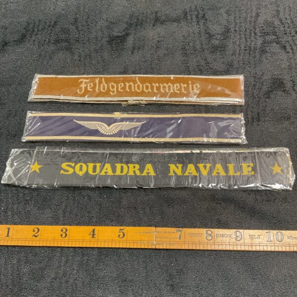 Lot of three original German WWII armbands for Luftwaffe, Police, and Feldgendarmerie.