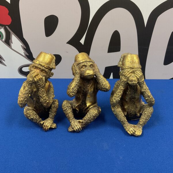 Gilt resin monkey set depicting the three wise monkeys proverb.