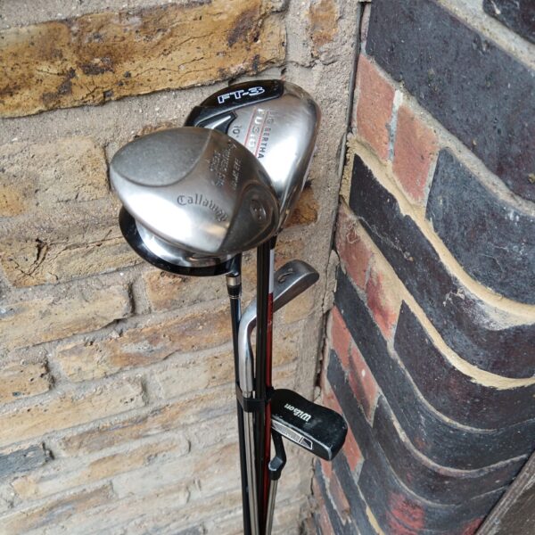 Golf club bundle featuring Callaway and Big Bertha clubs.