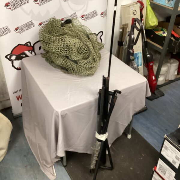 Portable golf practice net for backyard training.