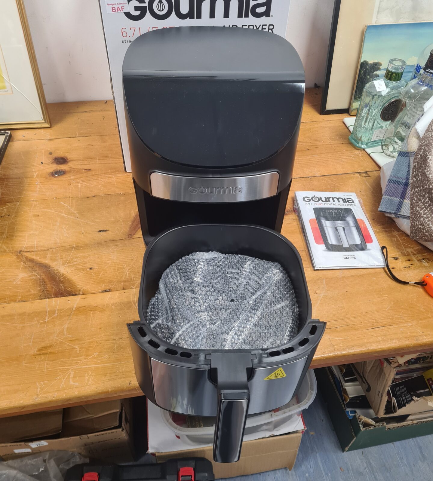 Close-up of the Gourmia 6.7L digital air fryer showing its stainless steel finish.