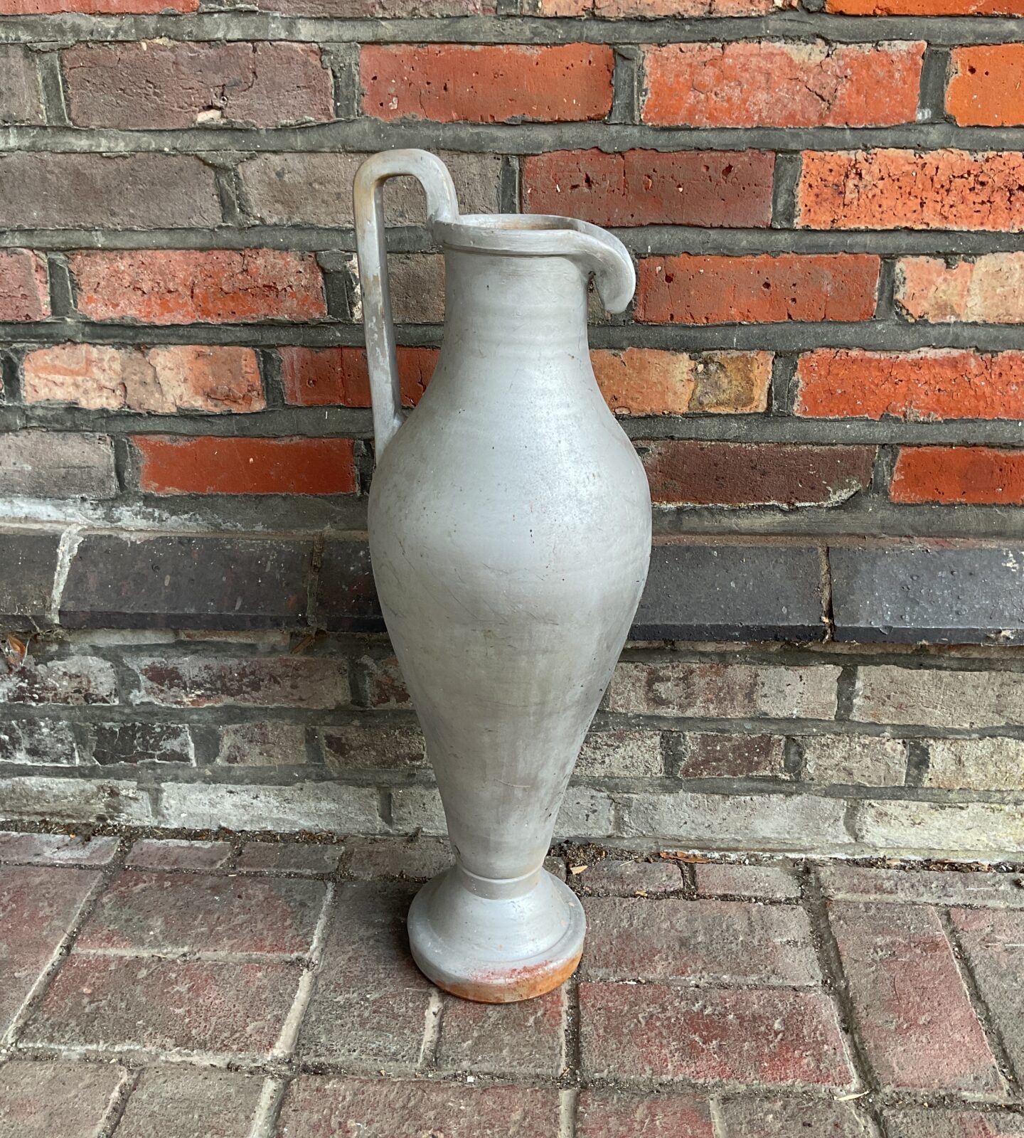 Large terracotta Greek style ewer, decorative pottery vessel.