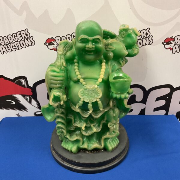 Large green Buddha statue for altar or home decor.