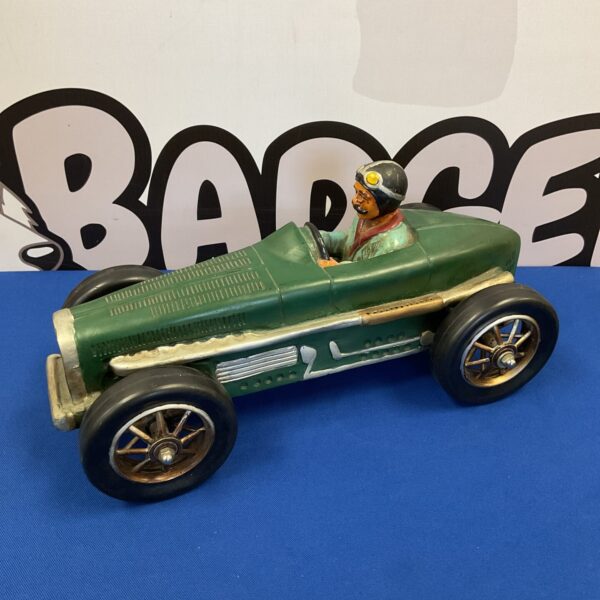 Vibrant green resin classic race car model for display.