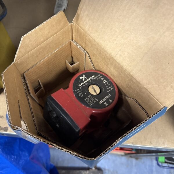 Used Grundfos UPS15-58 central heating pump for boiler systems.
